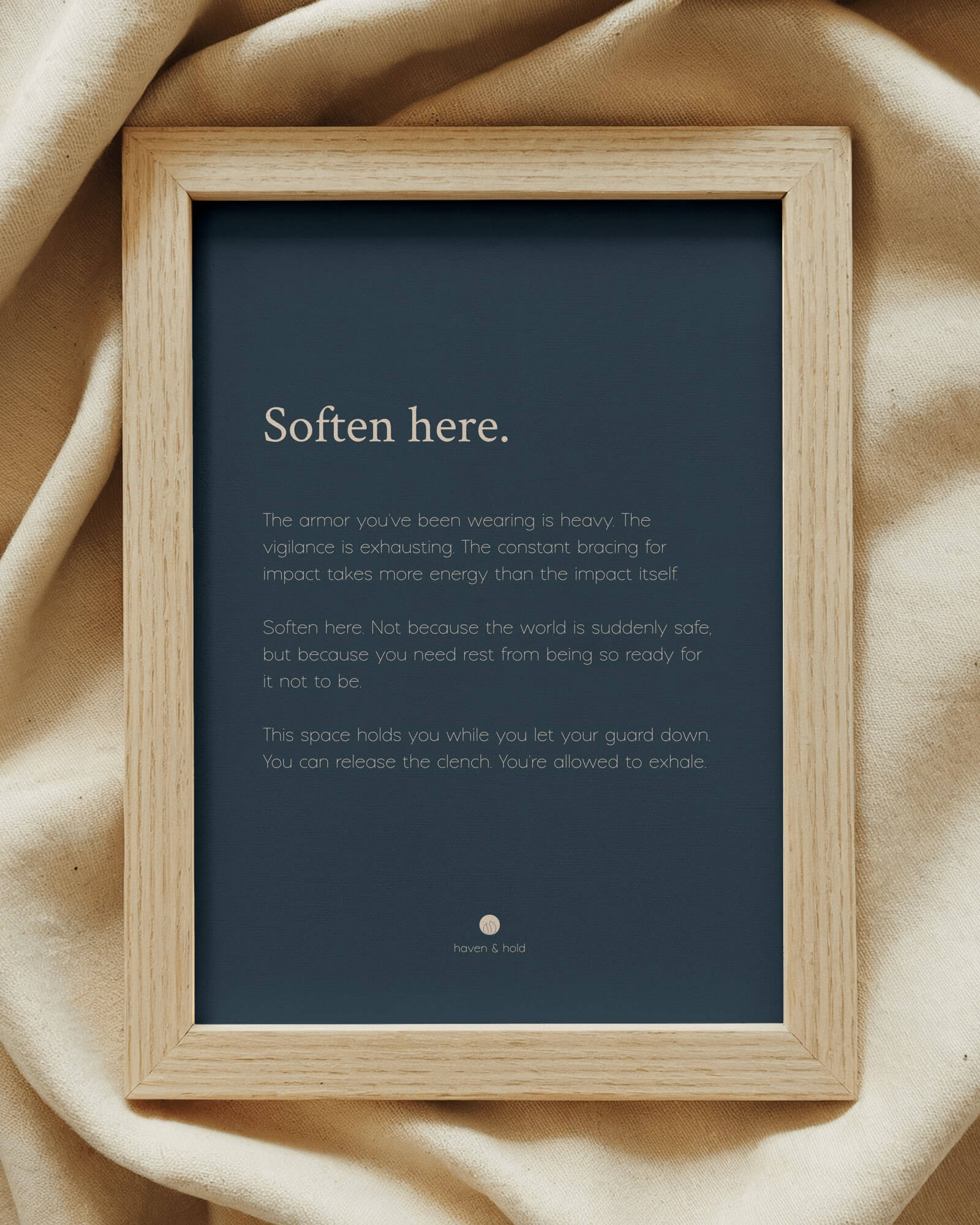 Soften Here framed wall art print on shelf display