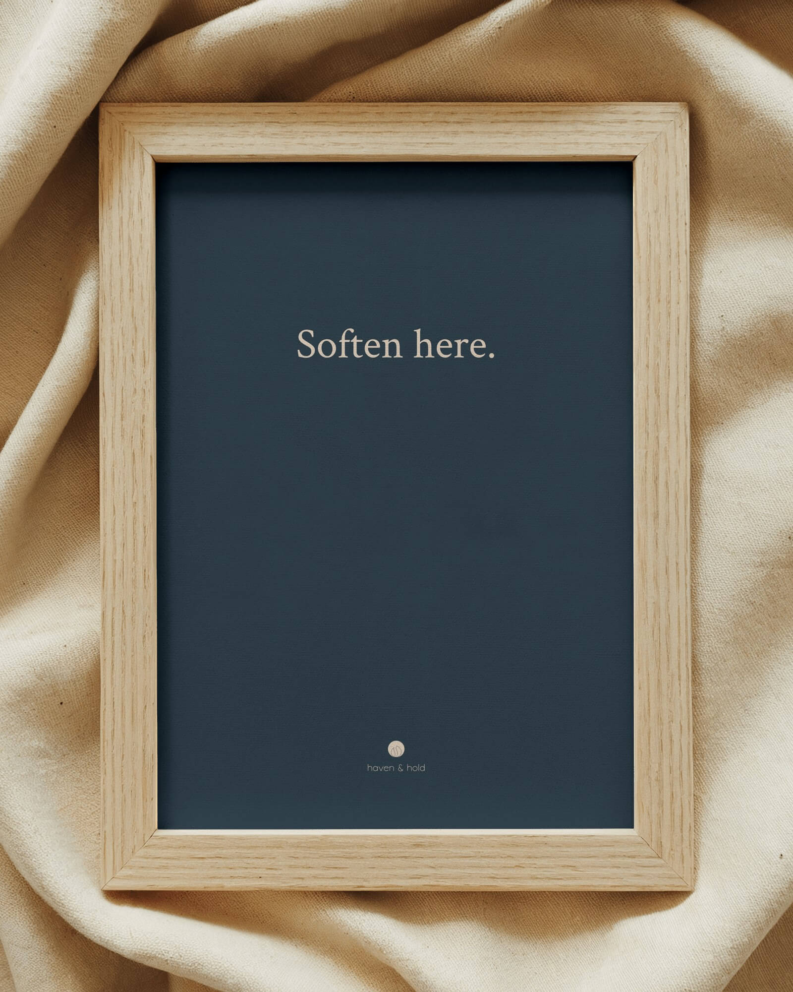 Soften Here framed typography print on shelf display