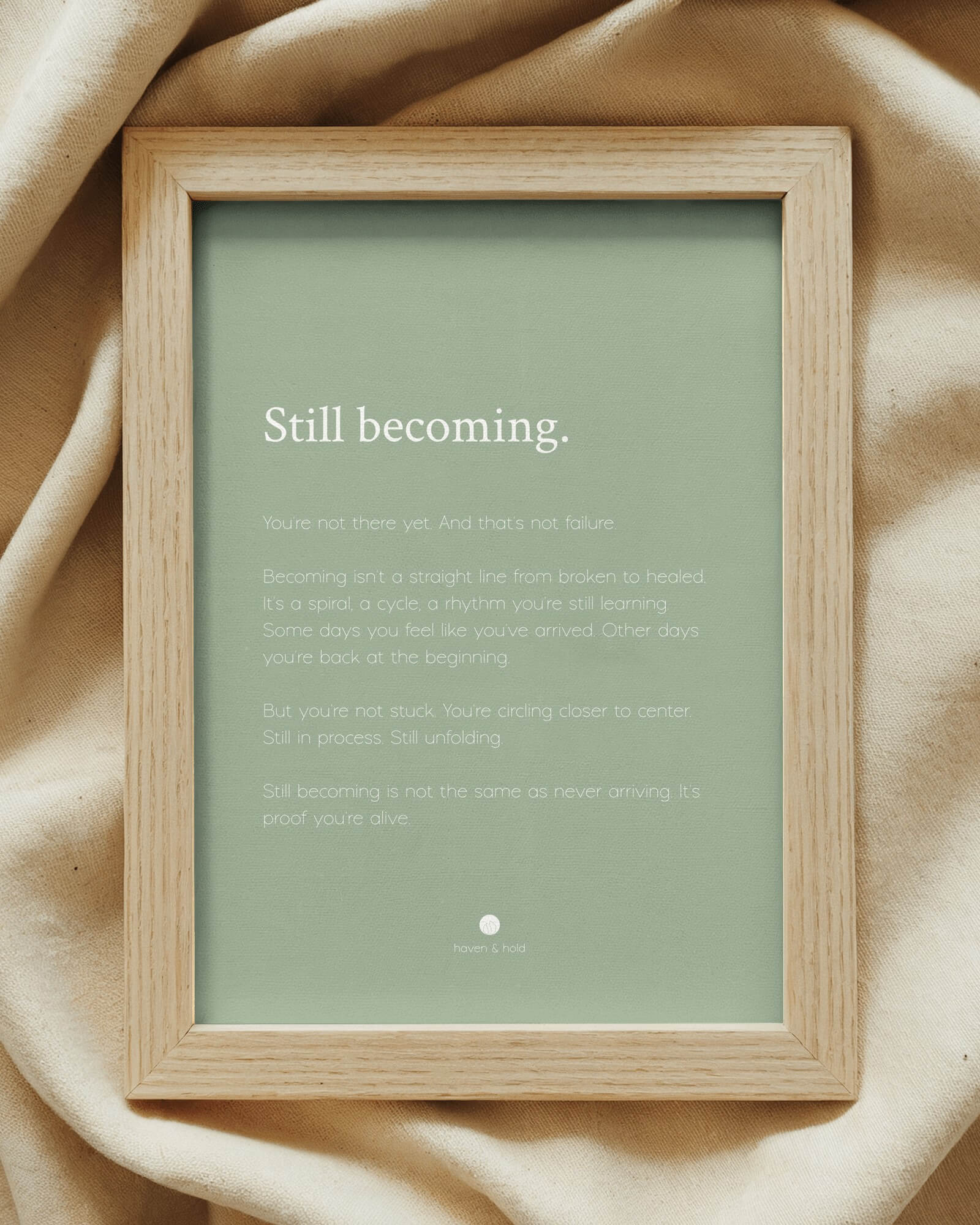 Still Becoming framed wall art print on shelf display